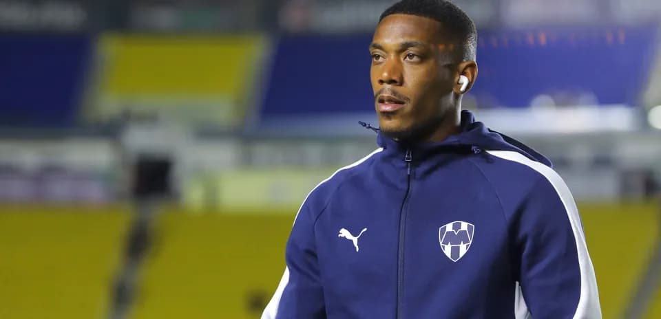 Player walking on field in training attire
