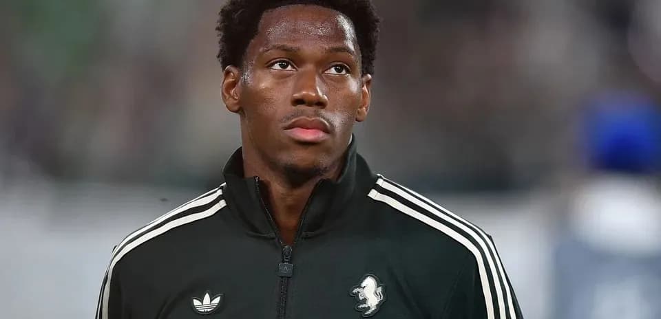 Player wearing team jacket before the match