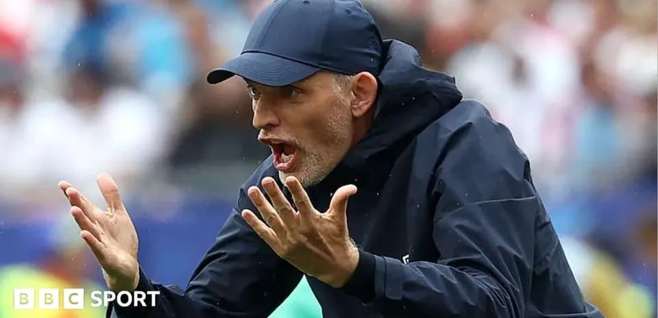 Coach gesturing during a match from the sidelines