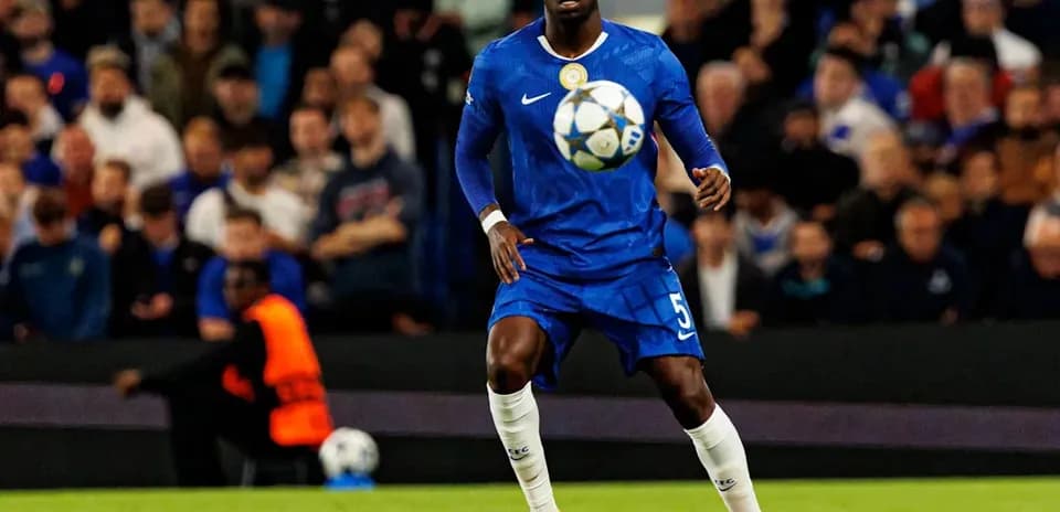 Player in blue jersey controlling the ball during match