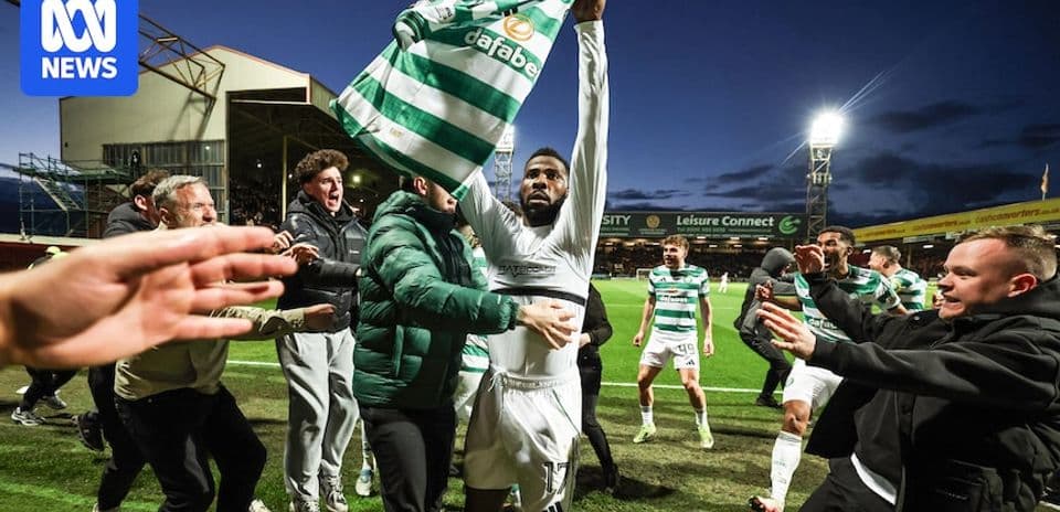 Player celebrating with fans after match victory