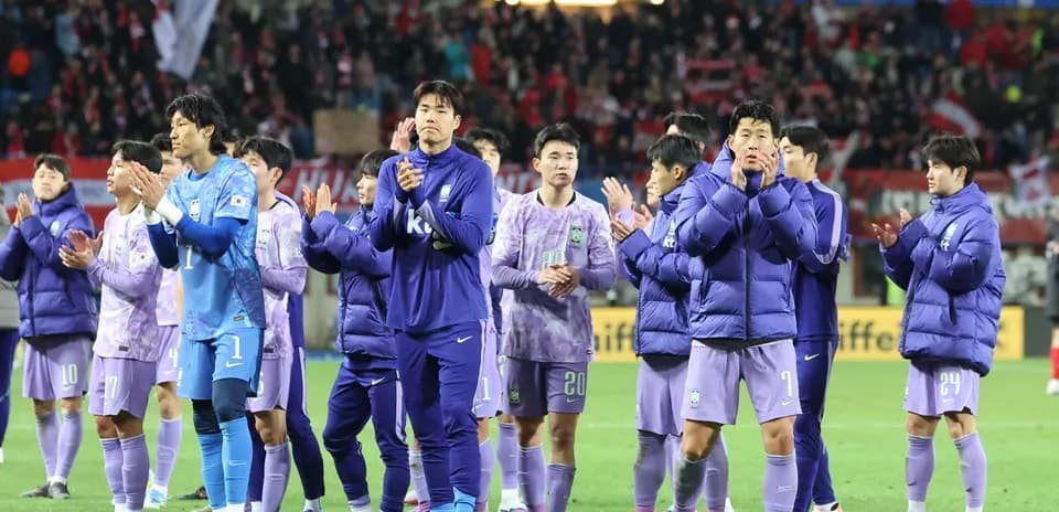 Players applauding fans after the match