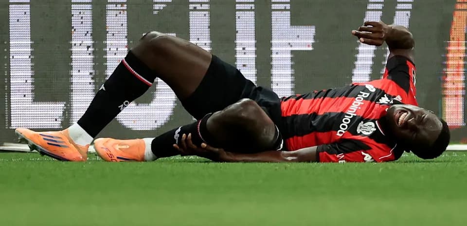 Player lying on ground after injury during match