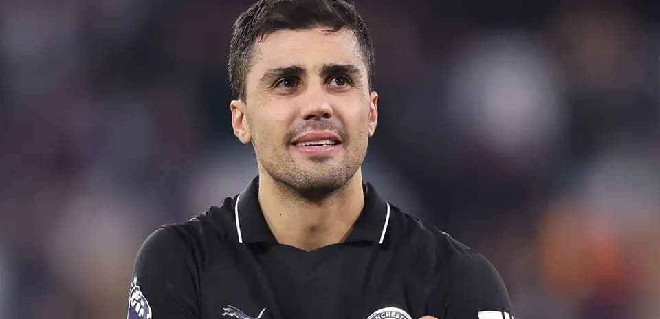 Player in black jersey looking at the crowd