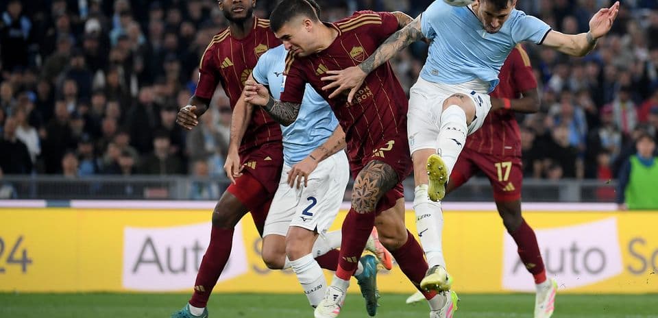 Players contesting during AS Roma vs Lazio match