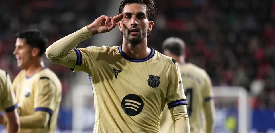 Player celebrating a goal with a salute gesture
