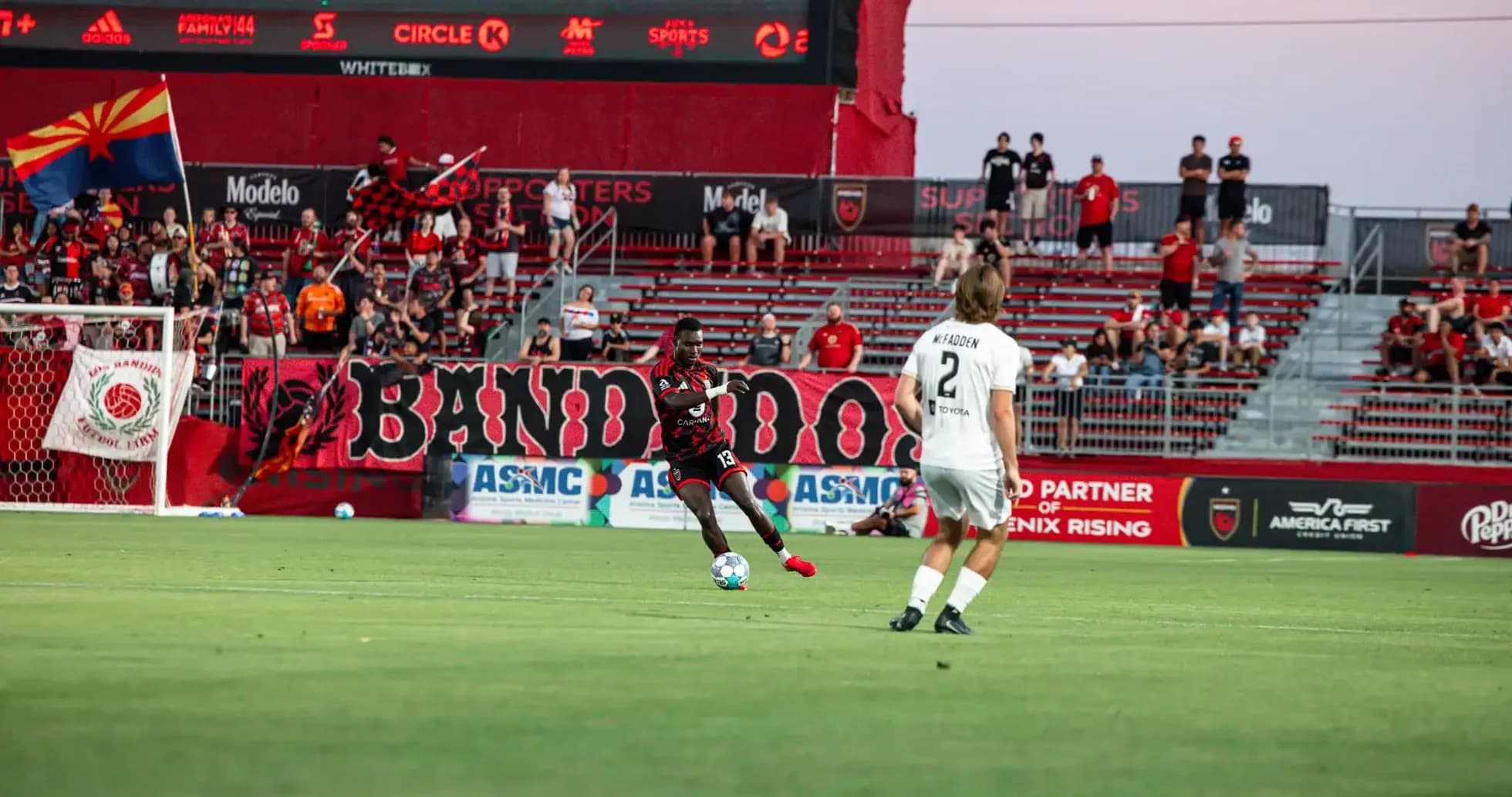 Player kicking ball during Phoenix Rising match