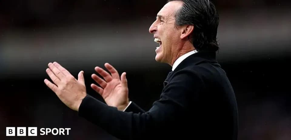 Manager gesturing and shouting on the sidelines