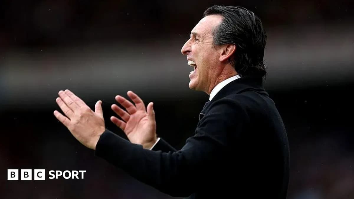 Manager gesturing and shouting on the sidelines