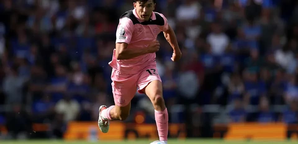 Player running with the ball during a match