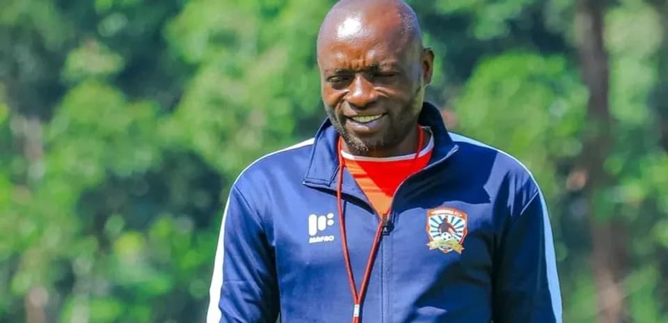 Coach walking during training session outdoors