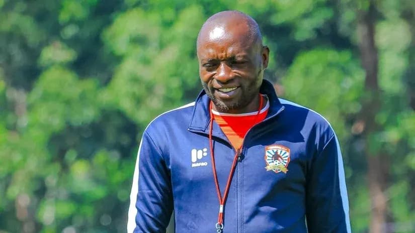 Coach walking during training session outdoors