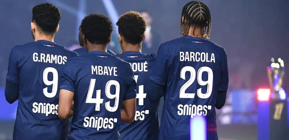 Four players showing their jerseys from behind