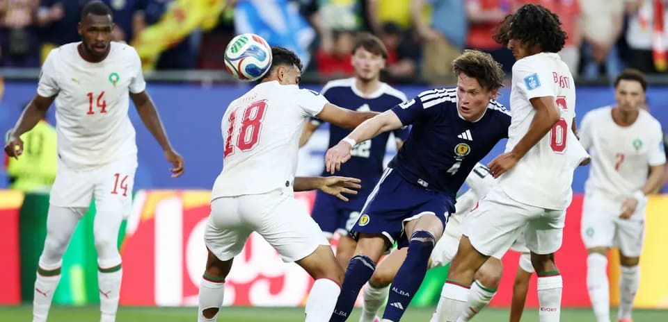 Players from Scotland and Morocco contesting the ball