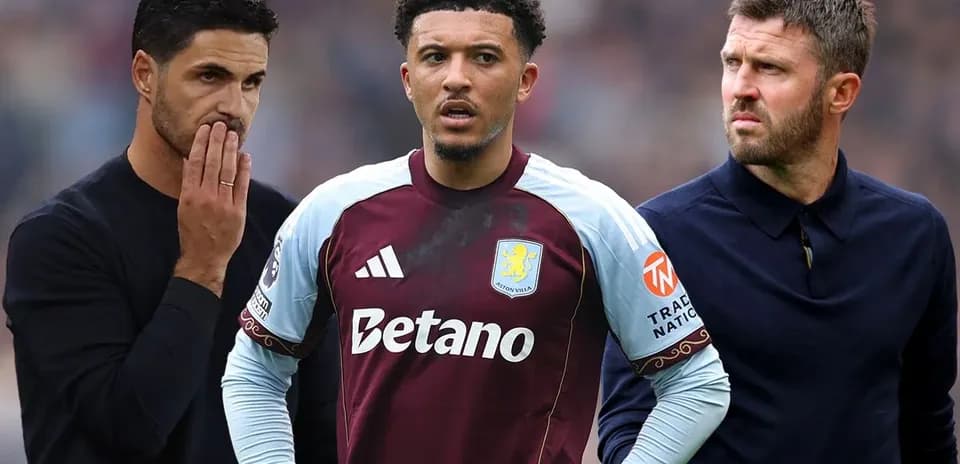 Three men, one in Aston Villa kit, discussing tactics