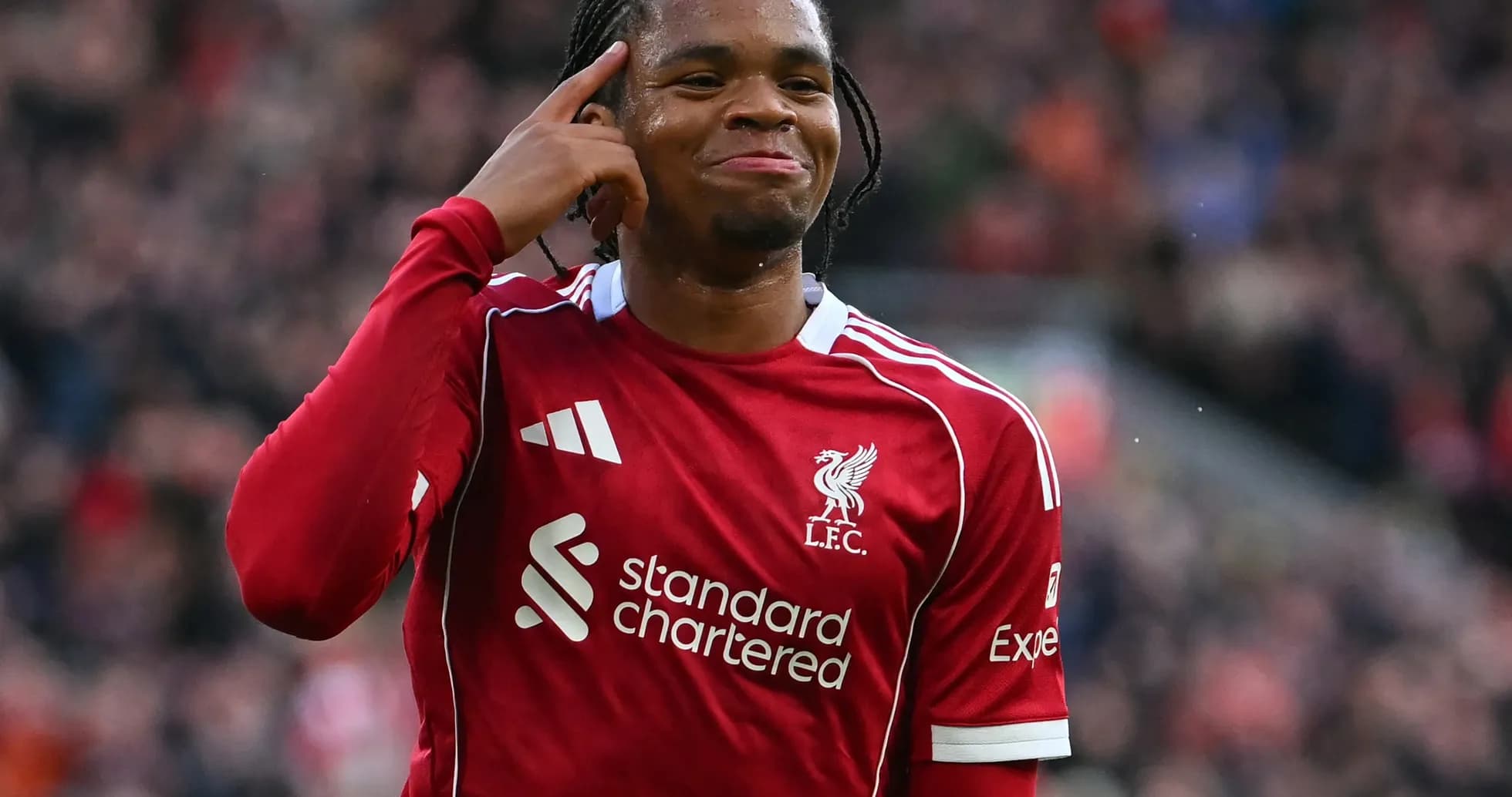 Liverpool player celebrating during match