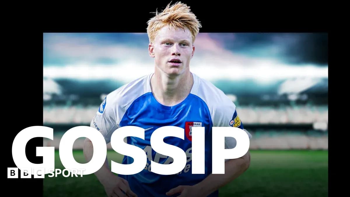 Player in blue and white jersey on football pitch