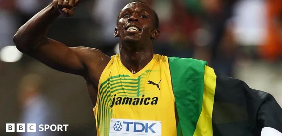 Athlete celebrating victory in Jamaica uniform