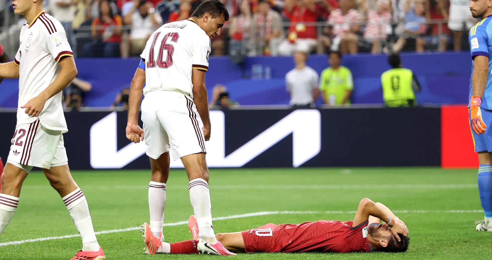 Player lying on the ground after a tackle