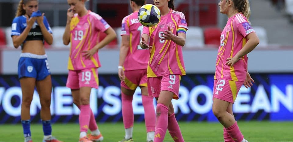 Players on the field during a women's football match
