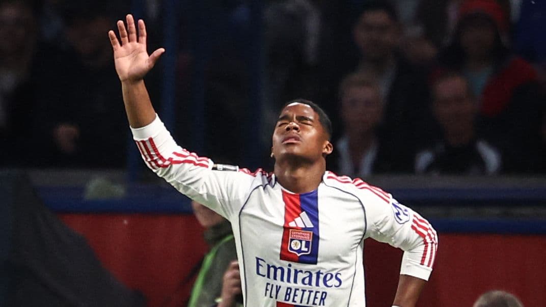 Player celebrating a goal with raised hand