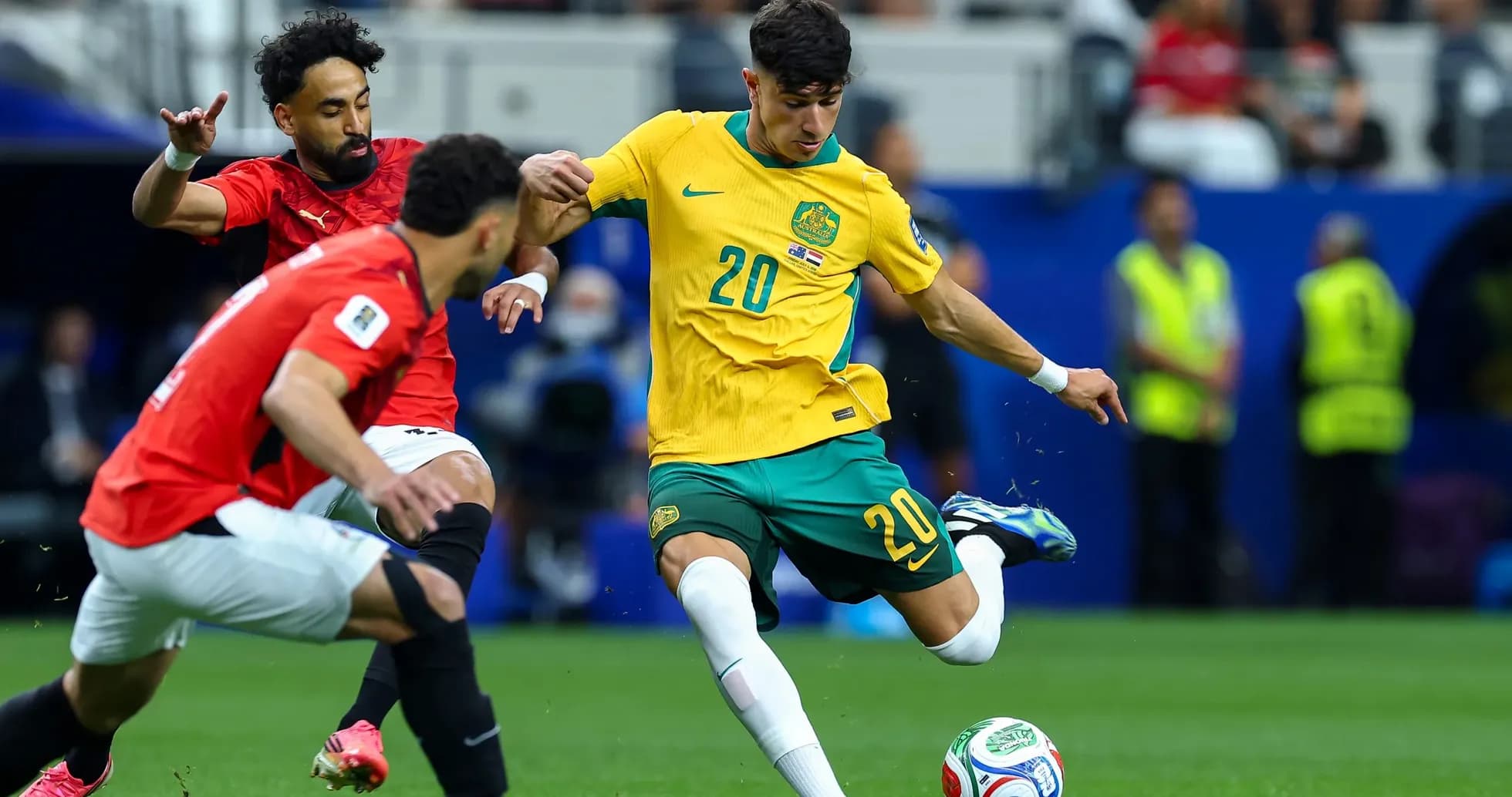 Player from Australia dribbling against Egypt