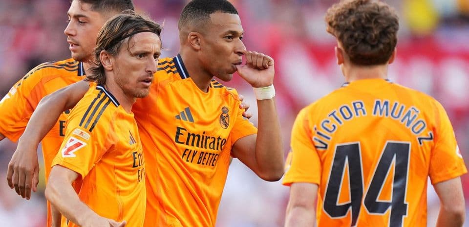 Real Madrid players celebrating a goal