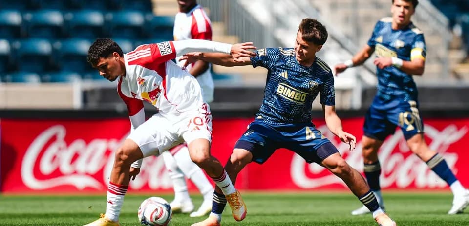 New York Red Bulls player challenged by Philadelphia Union