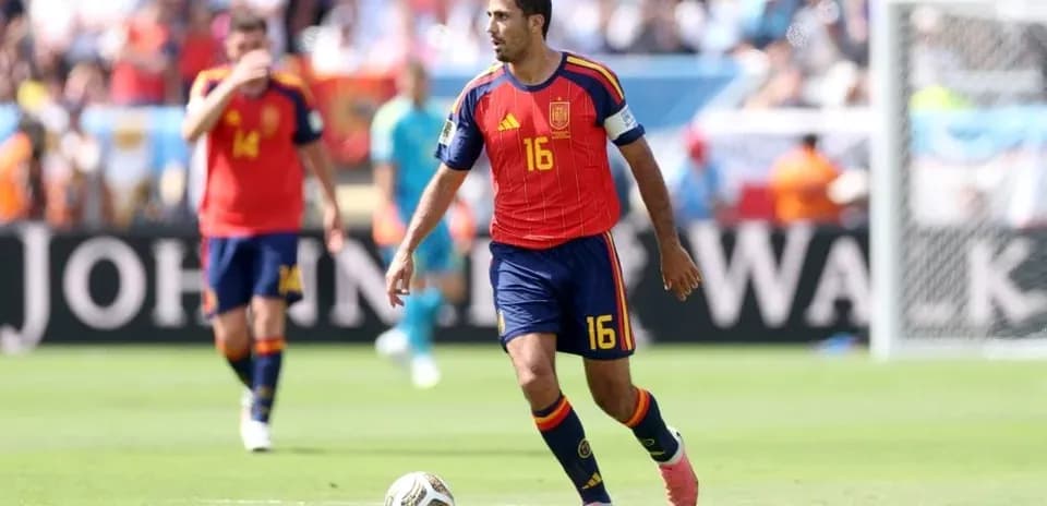Spain player dribbling ball during match