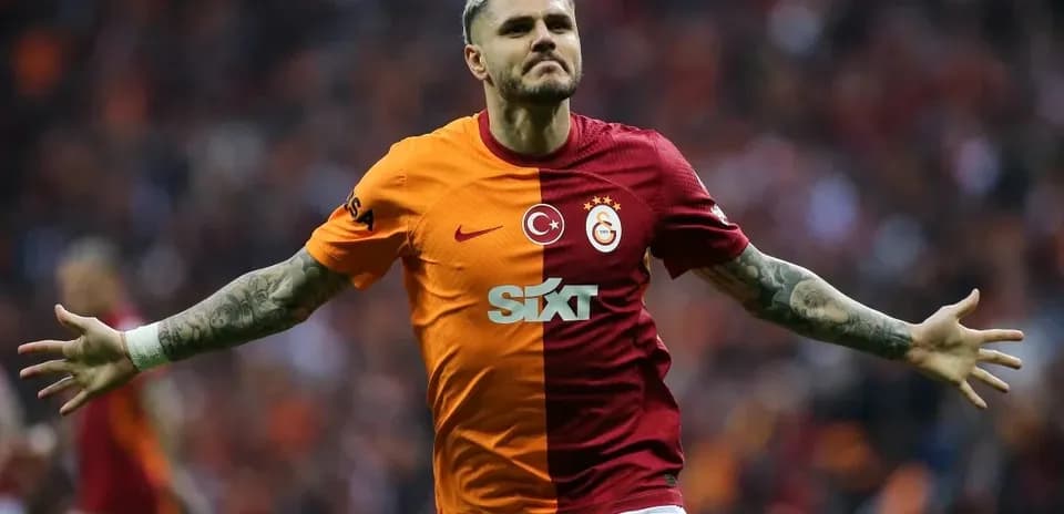 Player celebrating after scoring a goal for Galatasaray