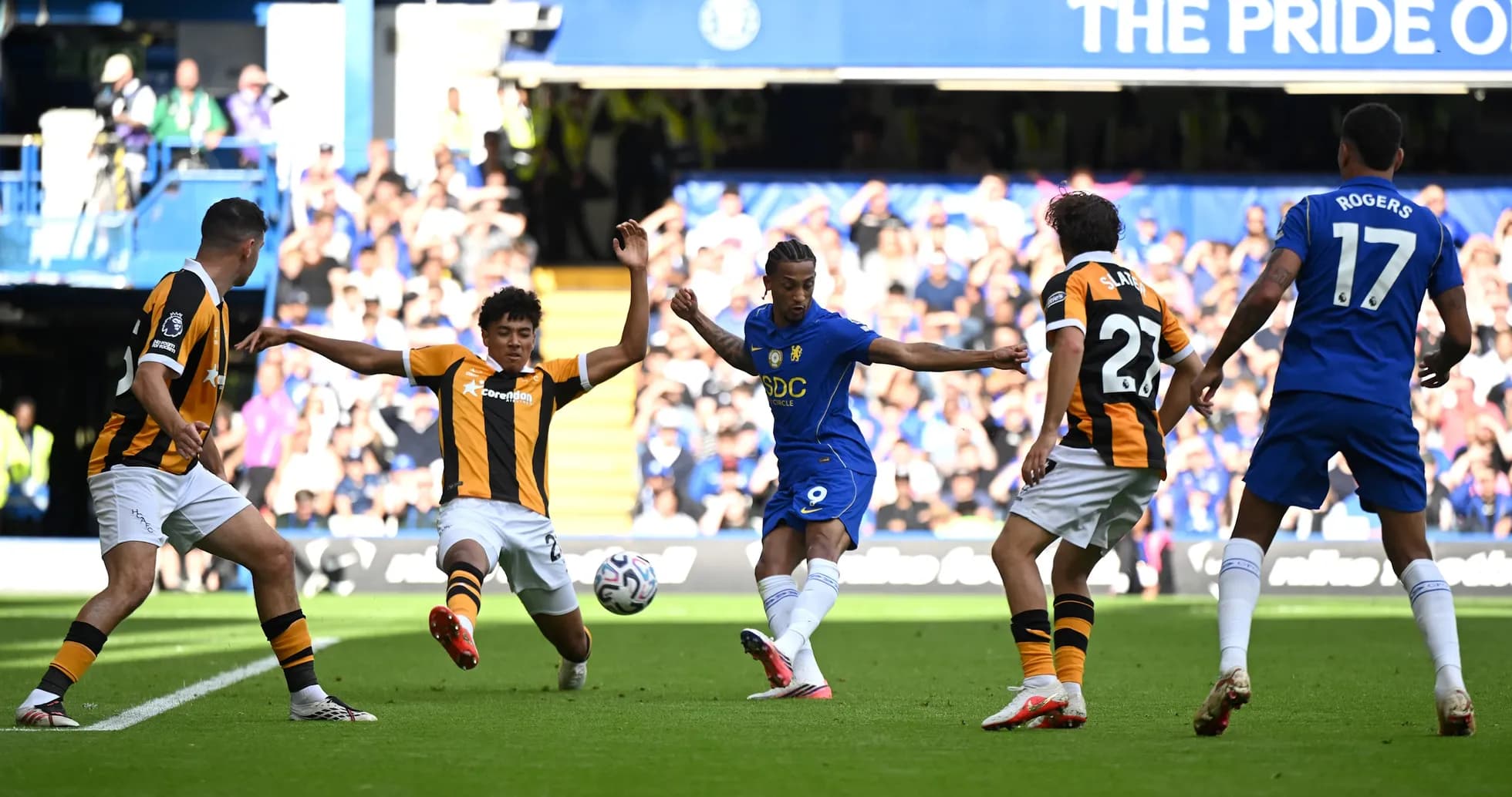 Chelsea player attempting to score against Hull City
