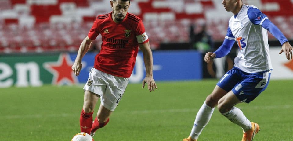 Benfica player dribbling during Europa League match