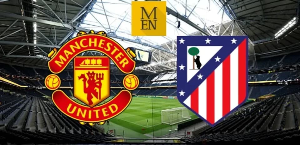 Logos of Manchester United and Atletico Madrid in stadium