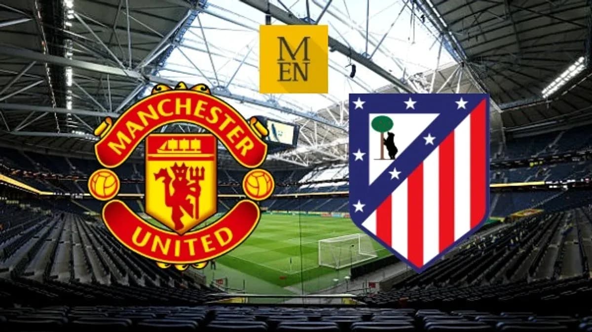 Logos of Manchester United and Atletico Madrid in stadium