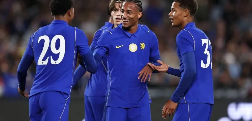 Chelsea players celebrating on the pitch
