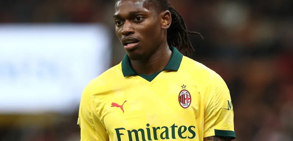 AC Milan player in yellow jersey during match