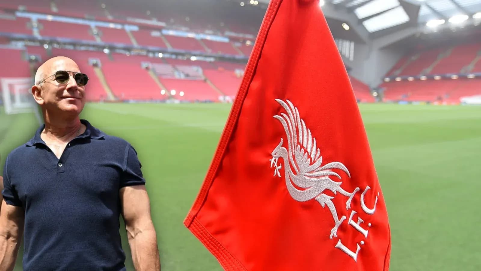 Man beside Liverpool FC corner flag at stadium
