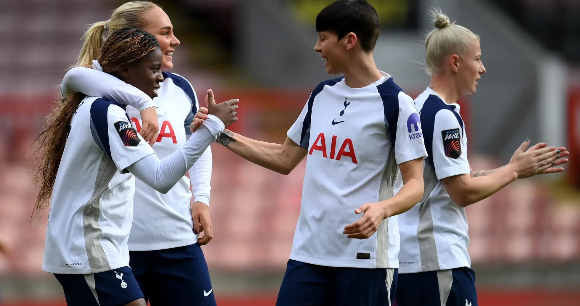 Tottenham players celebrating a goal during match