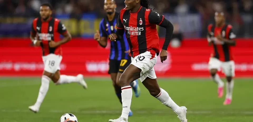 AC Milan player running with the ball during match