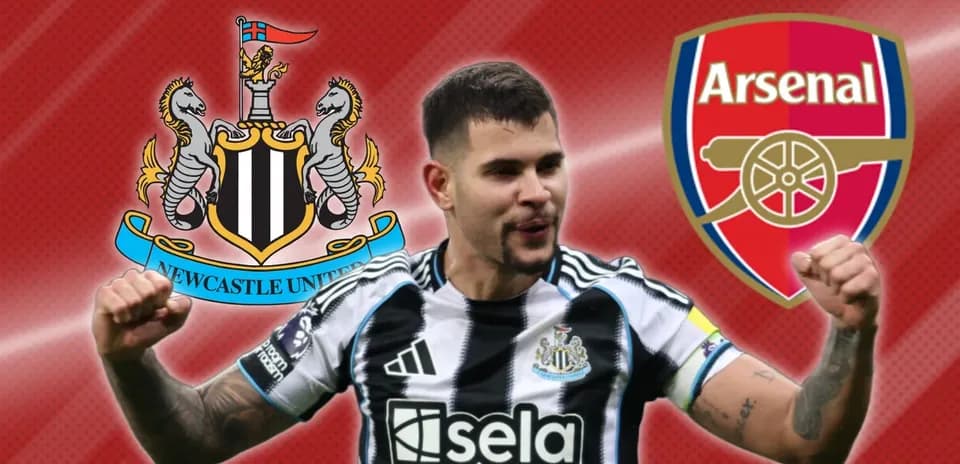 Newcastle player celebrating with club logos in background