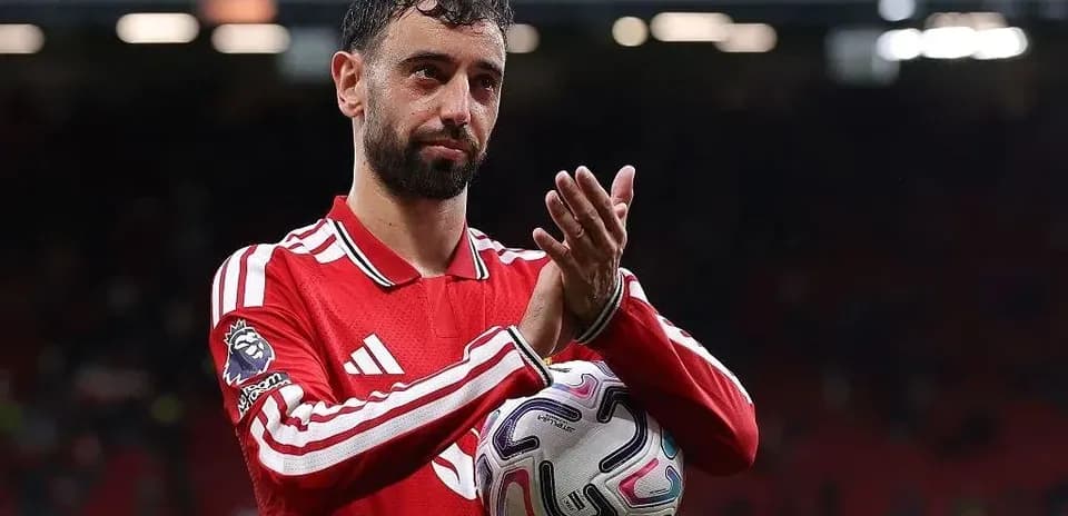 Bruno Fernandes applauding fans after match