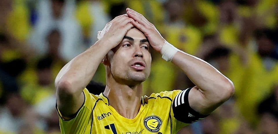 Player holding head in frustration during match
