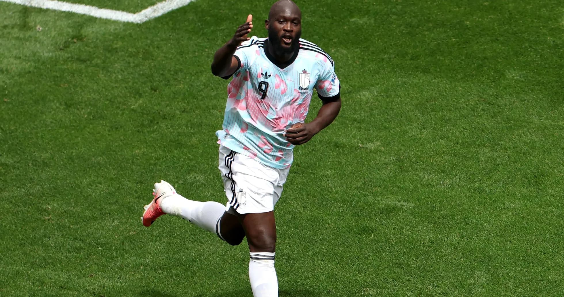 Player celebrating a goal on the field