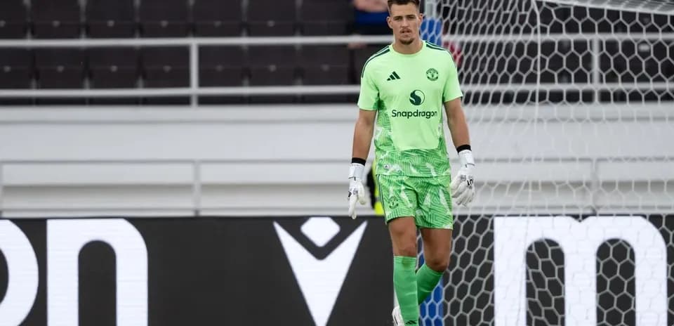 Goalkeeper in green uniform during match