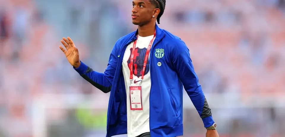 Player walking on the pitch before the match