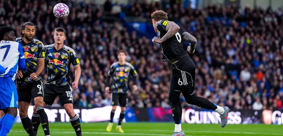 Leeds goalkeeper attempting to catch the ball