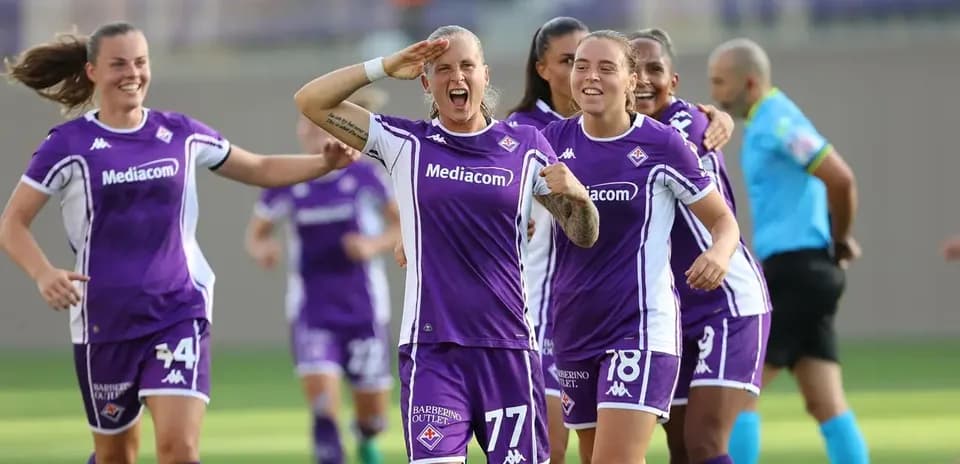 Fiorentina players celebrating a goal during match