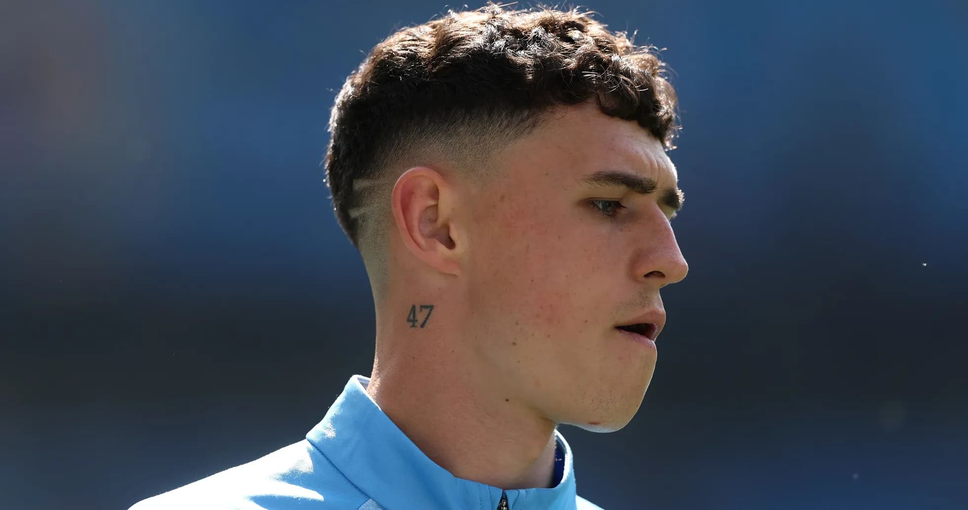 Player with tattoo during warm-up before match