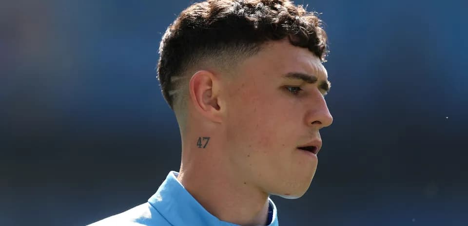 Player with tattoo during warm-up before match