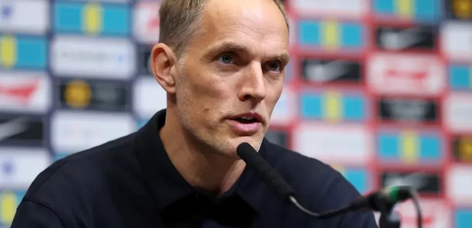 Manager speaking at press conference podium